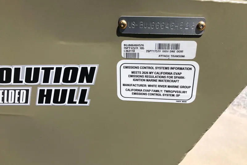 Slide: The Image of 2026 Tracker Pro Team 175 Crappie Edition boat with emissions control information label. - 15