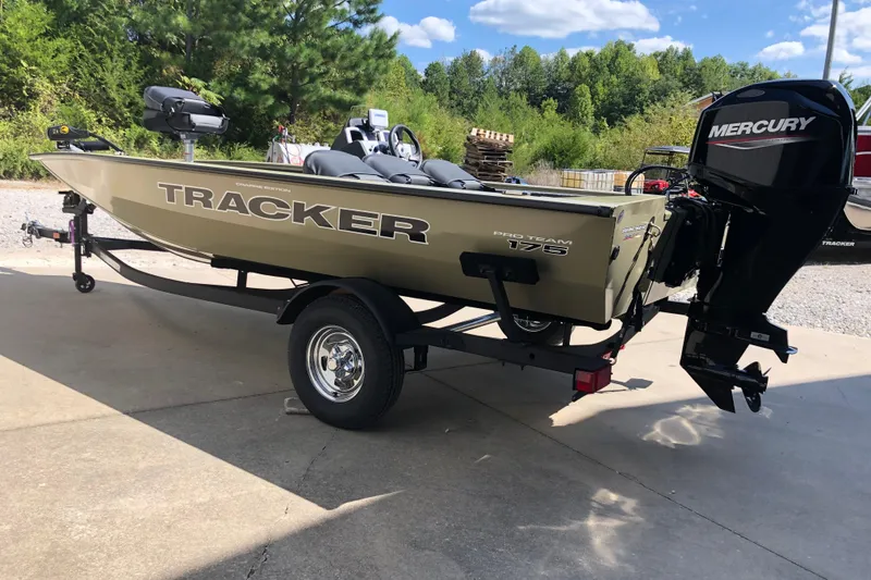 Slide: The Image of 2026 Tracker Pro Team 175 Crappie Edition boat with Mercury engine on trailer. - 3