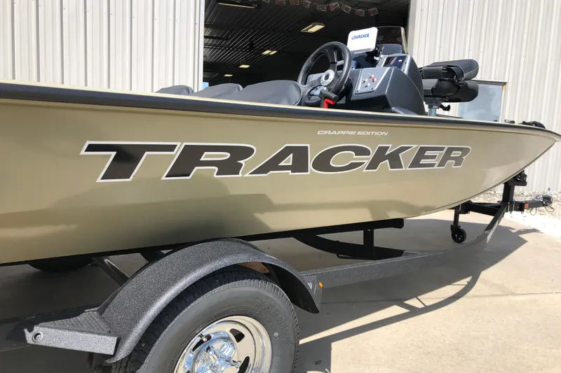 Slide: The Image of 2026 Tracker Pro Team 175 Crappie Edition boat on trailer, side view. - 8