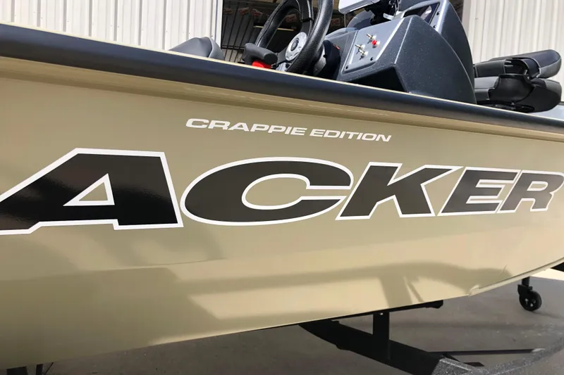 Slide: The Image of 2026 Tracker Pro Team 175 Crappie Edition boat, side view with branding. - 9