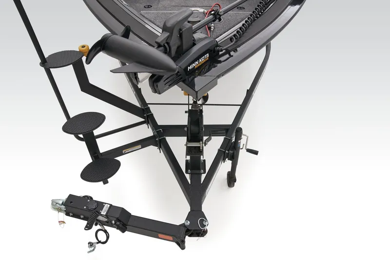 Slide: The Image of 2026 Tracker Targa V-18 WT boat interior with seating and Mercury engine. - 11