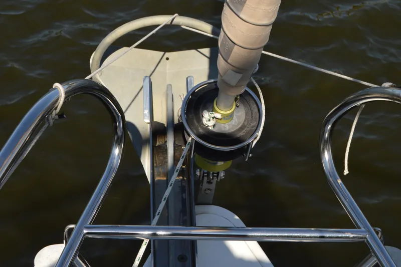 Slide: The Image of Bow of 2012 Beneteau Oceanis 34 sailboat with furling system and stainless steel railings. - 24