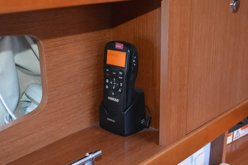 Slide: The Image of Simrad radio on Beneteau Oceanis 34 yacht, 2012 model, wooden interior. - 44