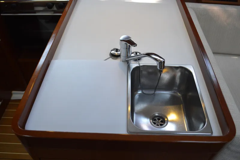Slide: The Image of Stainless steel sink in 2012 Beneteau Oceanis 34 yacht galley. - 45