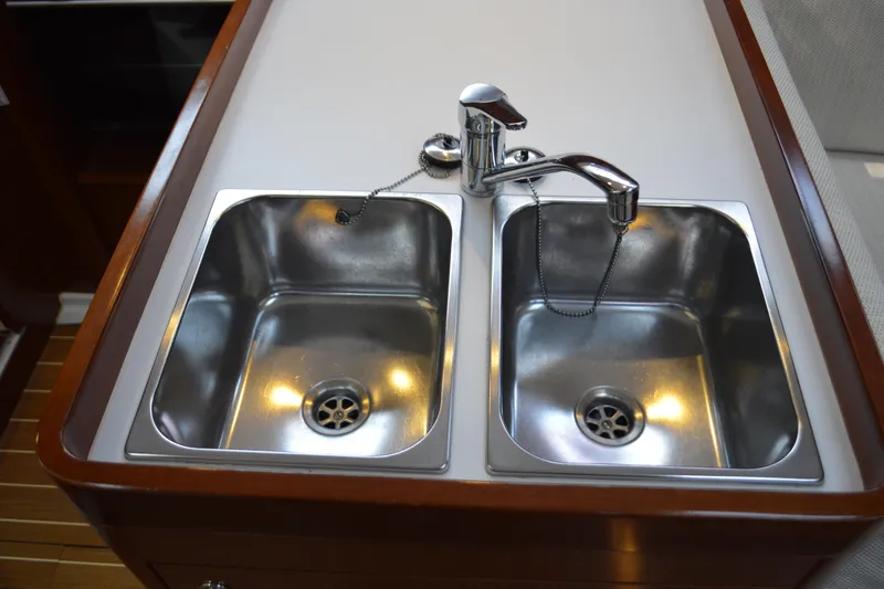Slide: The Image of Stainless steel double sink in 2012 Beneteau Oceanis 34 yacht kitchen. - 46