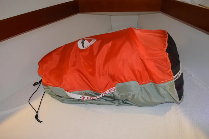 Slide: The Image of Red and gray sail bag on Beneteau Oceanis 34, 2012 model, interior view. - 59