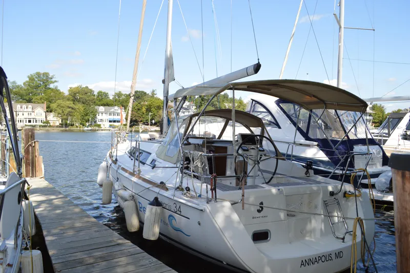 Slide: The Image of 2012 Beneteau Oceanis 34 sailboat docked in Annapolis marina, sunny day. - 7