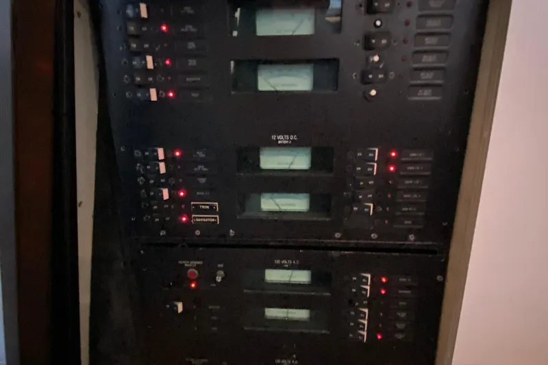 Slide: The Image of Electrical control panel on a 1989 Mainship Mediterranean Convertible boat. - 24