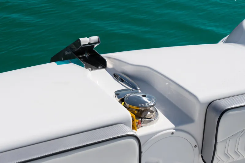 Slide: The Image of 2025 Twin Vee 260 GFX2 CC boat detail with sleek white finish and chrome fittings. - 27