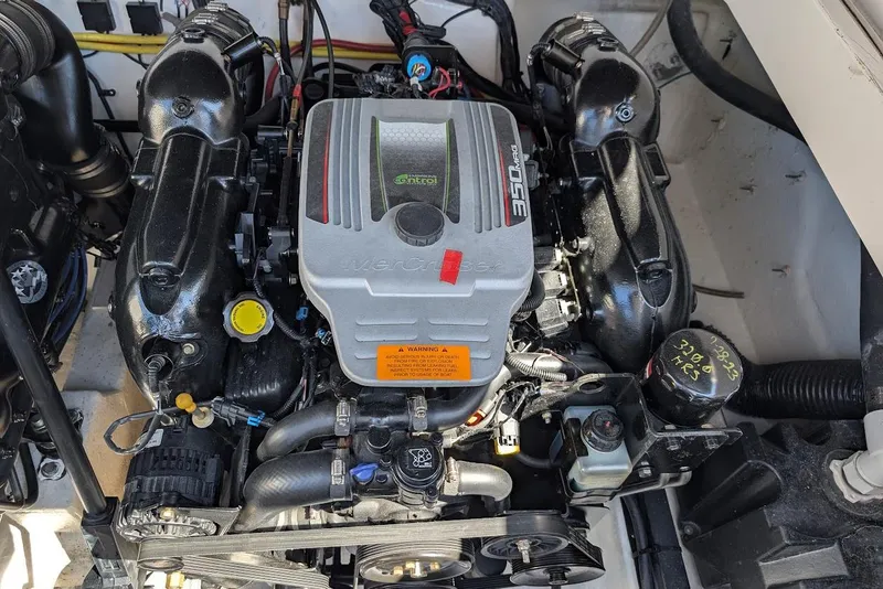 Slide: The Image of Engine of a 2016 Chaparral 307 SSX boat, featuring a MerCruiser 350 MAG. - 31