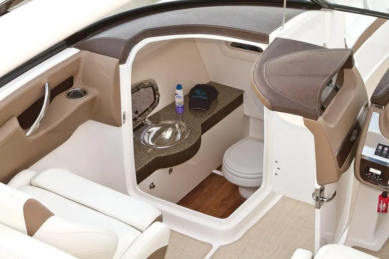 Slide: The Image of Manufacturer Provided Image: 2016 Chaparral 307 SSX boat interior with sink and toilet. - 42