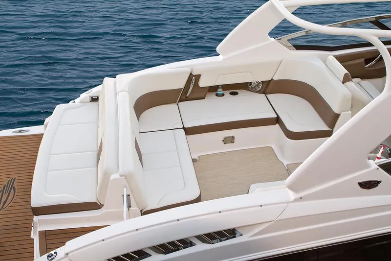 Slide: The Image of Manufacturer Provided Image: 2016 Chaparral 307 SSX boat with spacious seating area on the water. - 44