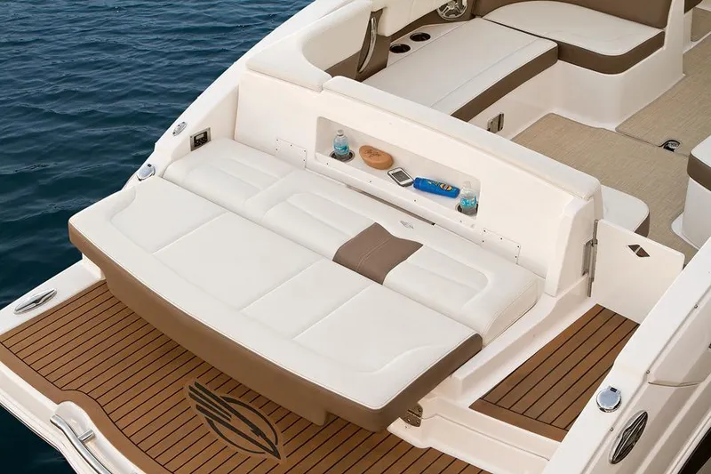 Slide: The Image of Manufacturer Provided Image: 2016 Chaparral 307 SSX boat interior with white and brown seating. - 45