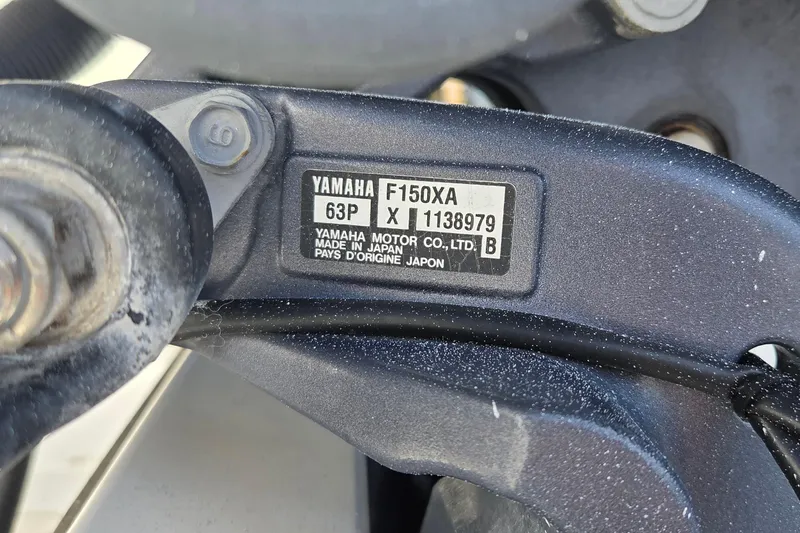 Slide: The Image of Yamaha F150XA engine label on 2014 Cobia 217 Center Console boat. - 15