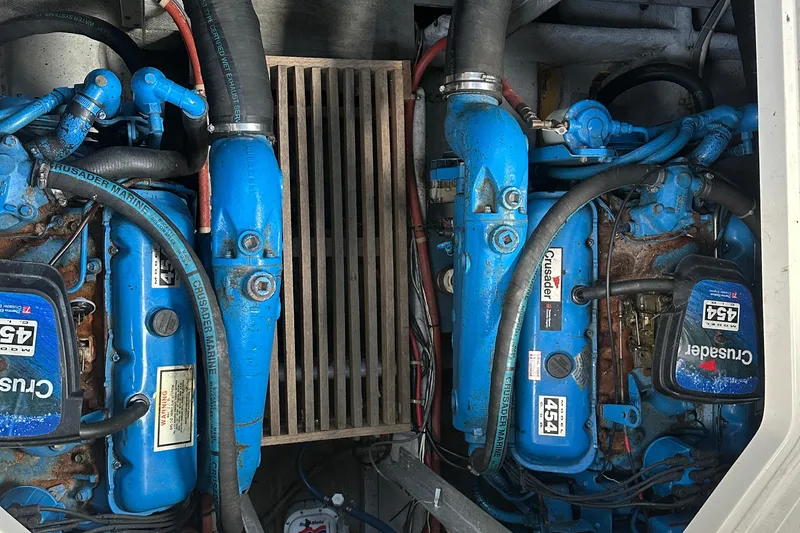 Slide: The Image of Engine compartment of a 1990 Silverton 34 Express with Crusader Marine engines. - 45