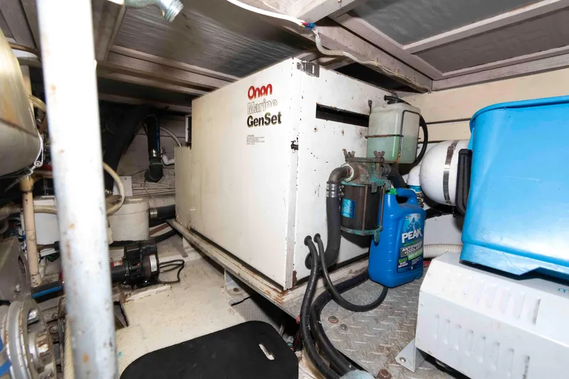 Slide: The Image of Engine room of 1990 Viking 50 Motor Yacht with Onan Marine GenSet generator. - 37