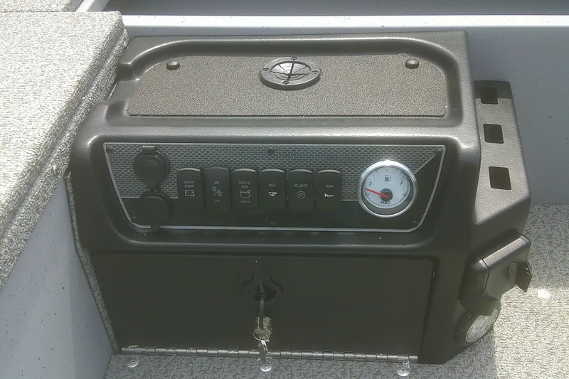Slide: The Image of Control panel of 2026 Lund 1800 Explorer Tiller boat with fuel gauge and switches. - 9