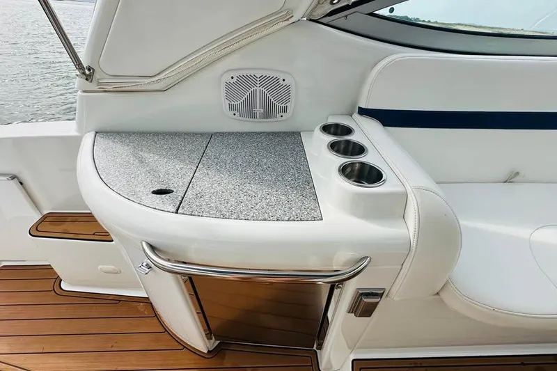 Slide: The Image of 2006 Formula 31 Performance Cruiser interior with countertop, cup holders, and seating. - 8