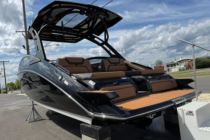 Slide: The Image of 2026 Yamaha Boats 275SD interior with luxurious seating and sleek design. - 16