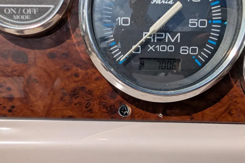 Slide: The Image of Close-up of 2001 Regal Commodore 2660 RPM gauge on wood grain dashboard. - 18