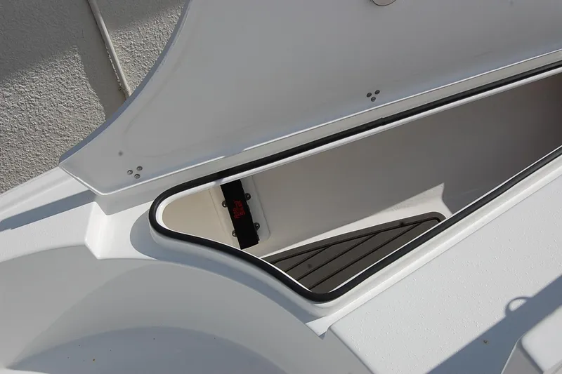 Slide: The Image of Open storage compartment on 2026 Cape Horn 23 Cape Bay boat. - 18