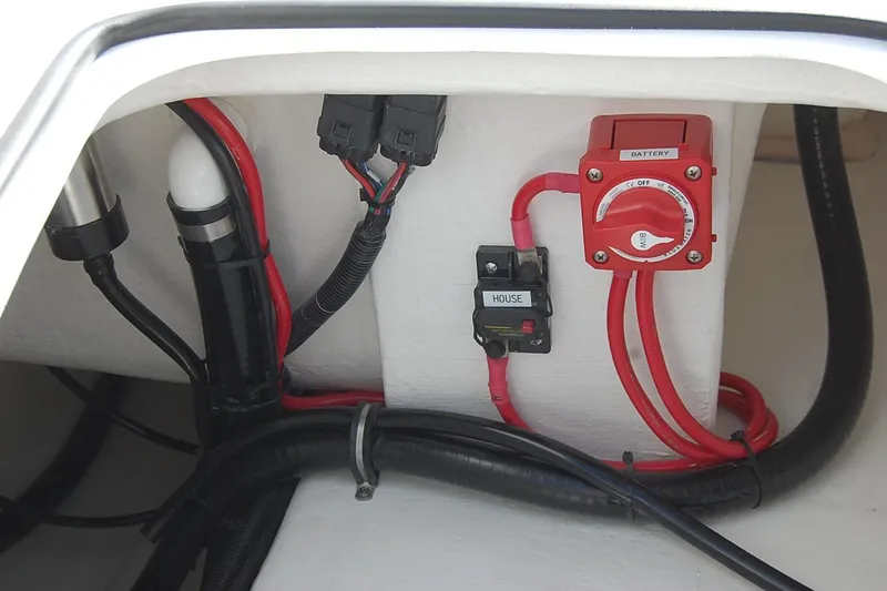 Slide: The Image of Electrical wiring and battery switch in 2026 Cape Horn 23 Cape Bay boat. - 4