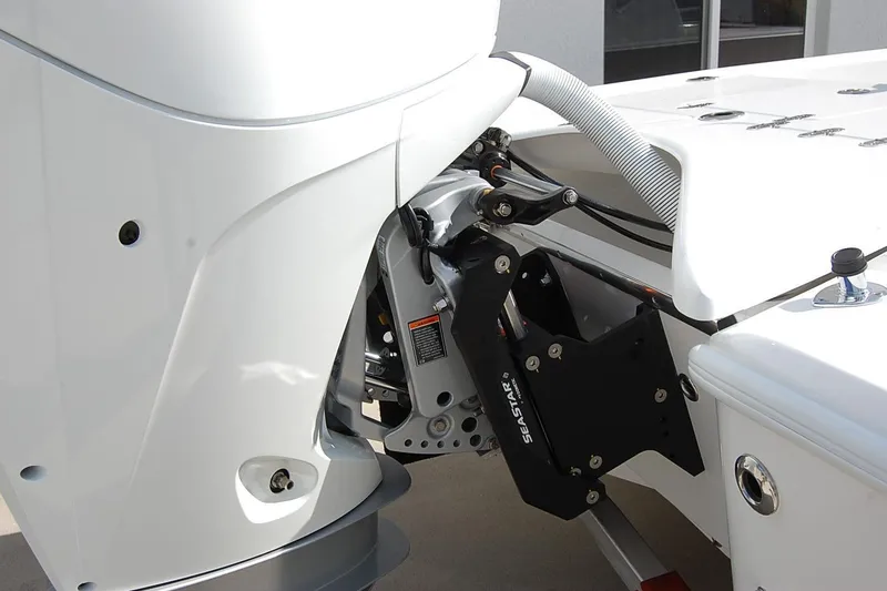 Slide: The Image of 2026 Cape Horn 23 Cape Bay boat engine detail with SeaStar hydraulic steering system. - 6