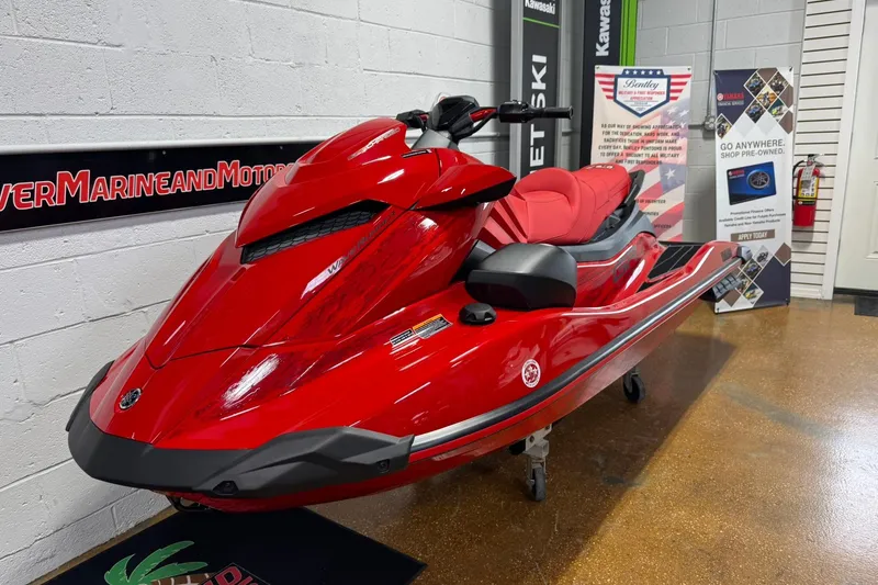 The Image of 2026 Yamaha WaveRunner GP SVHO in vibrant red on display indoors. - 0