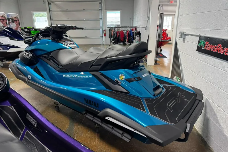 Slide: The Image of Manufacturer Provided Image: Two people riding a 2026 Yamaha WaveRunner FX Cruiser SVHO on water. - 9