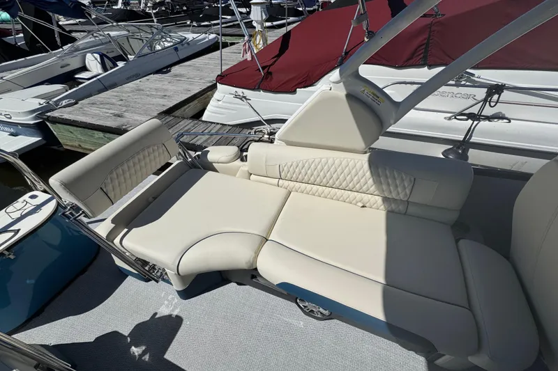 Slide: The Image of Luxurious seating on 2026 Tahoe Pontoon Grand Tahoe LTD Quad Lounge at marina. - 11