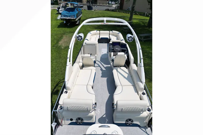 Slide: The Image of 2026 Tahoe Pontoon Grand Tahoe LTD Quad Lounge with spacious seating and modern design. - 4
