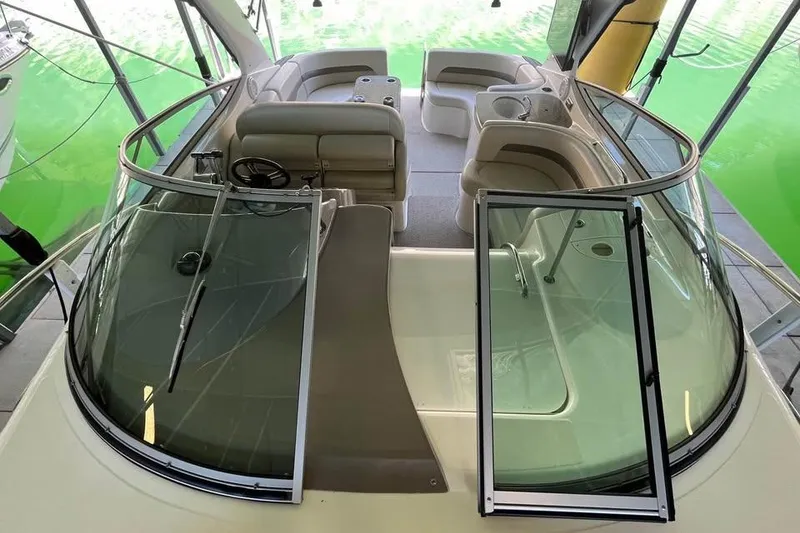 Slide: The Image of 2008 Chaparral 330 Signature boat interior with seating and steering wheel. - 5