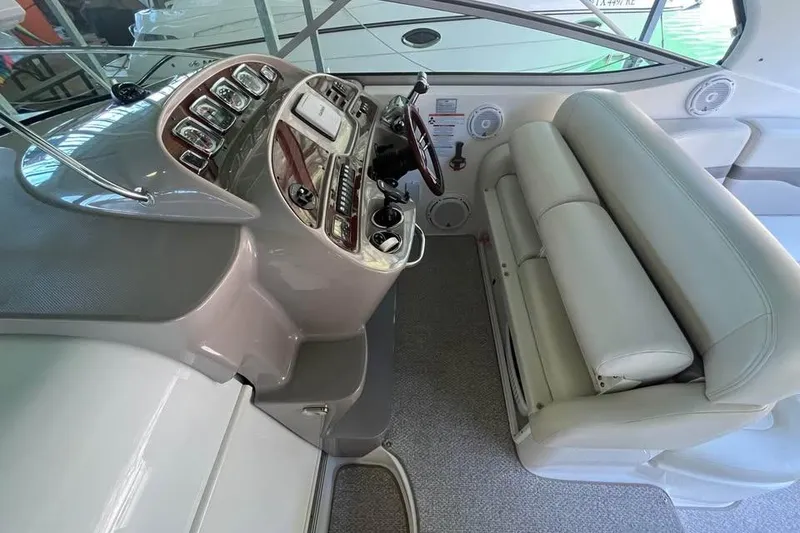 Slide: The Image of 2008 Chaparral 330 Signature boat cockpit with steering wheel and control panel. - 6