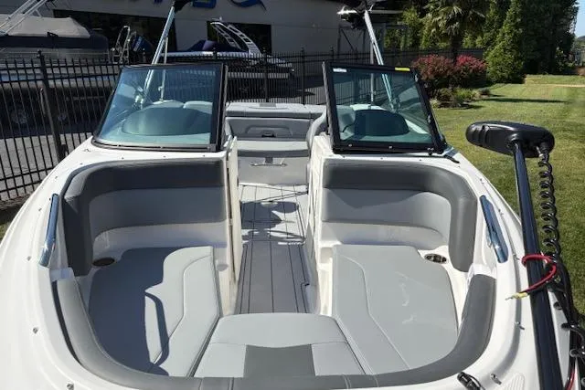 Slide: The Image of 2026 Chaparral 21 SSi Ski & Fish boat interior with seating and windshield. - 9