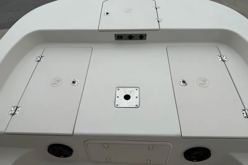 Slide: The Image of 2022 Carolina Skiff 17 LS boat deck with storage compartments and mounting plate. - 8
