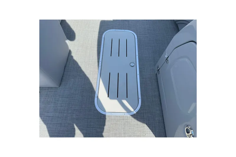 Slide: The Image of 2025 Bentley Pontoons Legacy 243 Navigator interior floor hatch detail. - 15