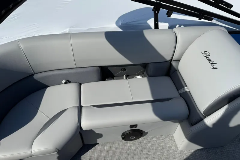 Slide: The Image of Luxurious seating on the 2025 Bentley Pontoons Legacy 243 Navigator boat. - 17