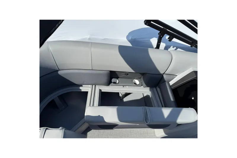 Slide: The Image of 2025 Bentley Pontoons Legacy 243 Navigator interior seating with storage compartments. - 18