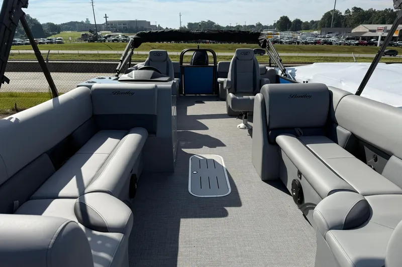 Slide: The Image of 2025 Bentley Pontoons Legacy 243 Navigator interior with spacious seating and modern design. - 6