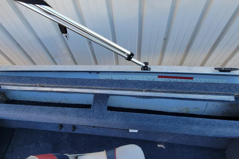 Slide: The Image of Open hatch on 1997 Sea Nymph 168 DLX boat deck, showing interior compartment. - 20