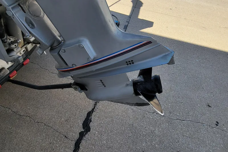 Slide: The Image of 1997 Sea Nymph 168 DLX boat with Evinrude 90 outboard motor, docked. - 8