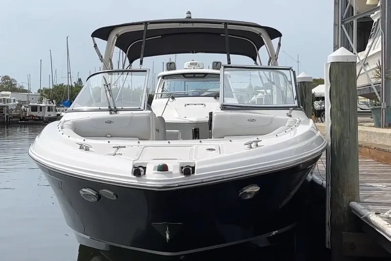 Slide: The Image of 2016 Regal 2700 ES Bowrider docked at marina, front view. - 3