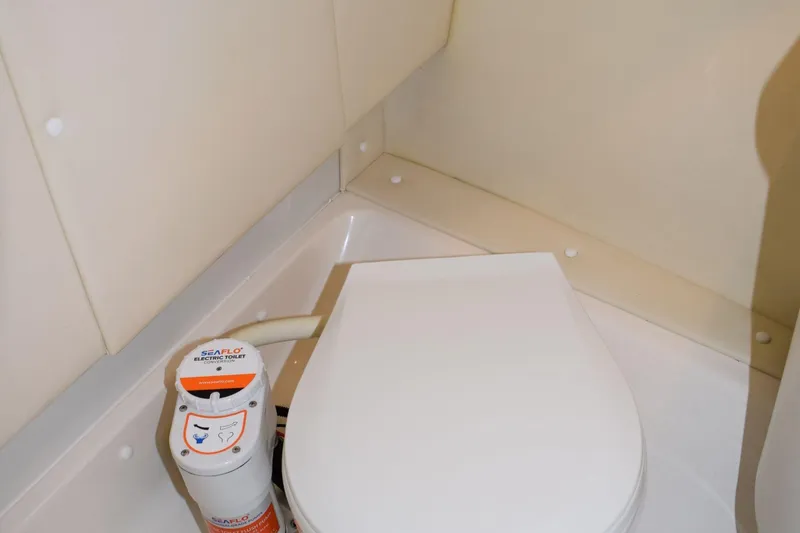 Slide: The Image of Electric toilet in 2002 Tiara 2900 Coronet boat bathroom. - 18