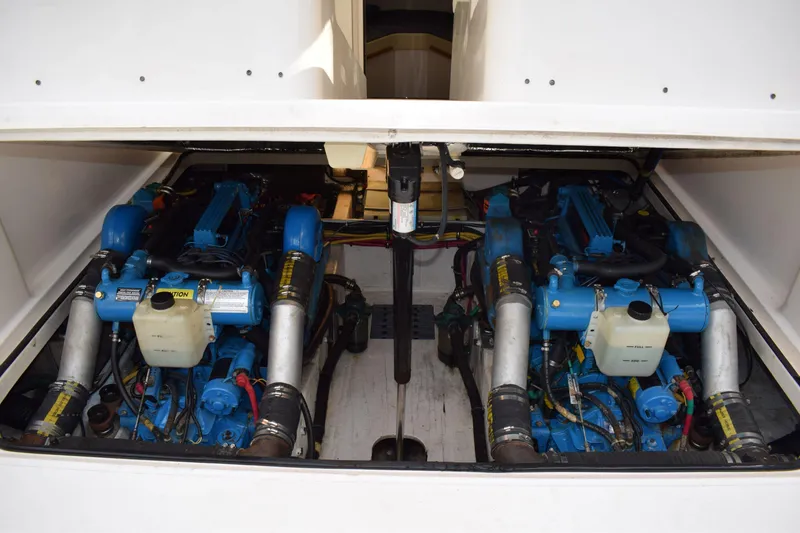 Slide: The Image of Engine compartment of a 2002 Tiara 2900 Coronet with dual blue engines. - 20