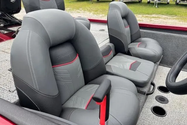 Slide: The Image of 2023 Tracker Pro Team 175 TXW boat interior with gray and red cushioned seats. - 11