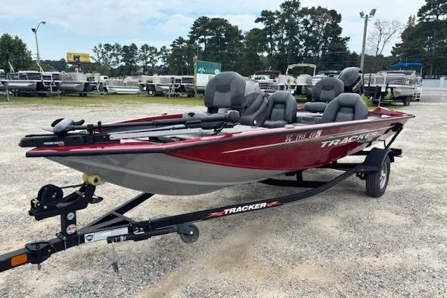 Slide: The Image of 2023 Tracker Pro Team 175 TXW boat on trailer, parked outdoors. - 5