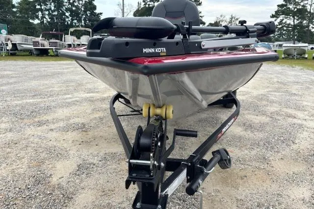 Slide: The Image of 2023 Tracker Pro Team 175 TXW boat with Minn Kota trolling motor on trailer. - 6