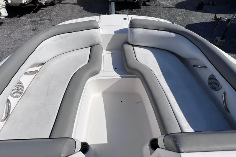 Slide: The Image of 2018 Bayliner 210 Deck Boat interior with spacious seating and modern design. - 15