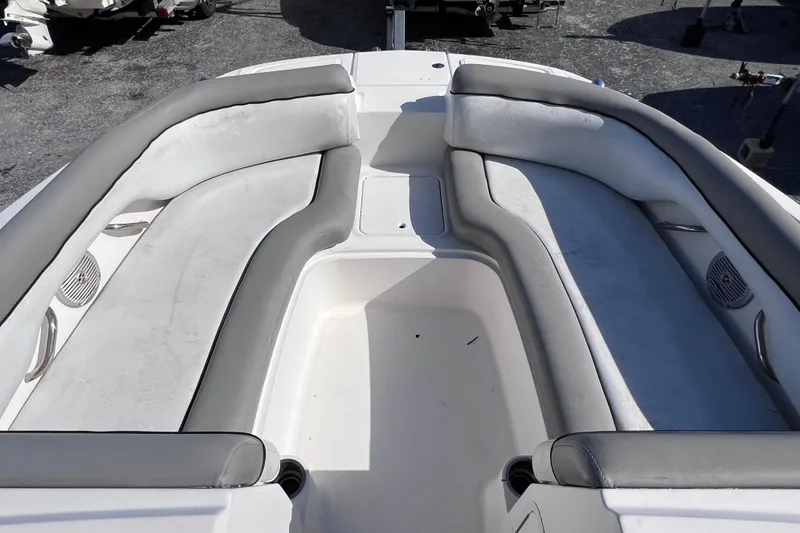 Slide: The Image of 2018 Bayliner 210 Deck Boat interior with spacious seating and sleek design. - 16
