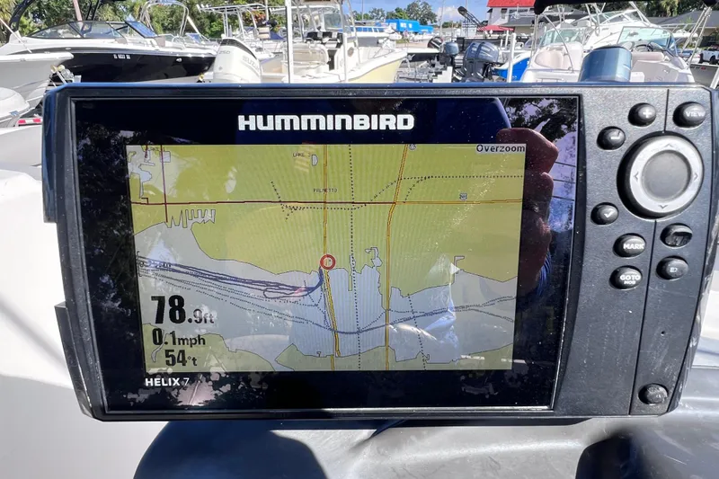Slide: The Image of Humminbird GPS display on 2018 Bayliner 210 Deck Boat, showing navigation map and speed. - 22